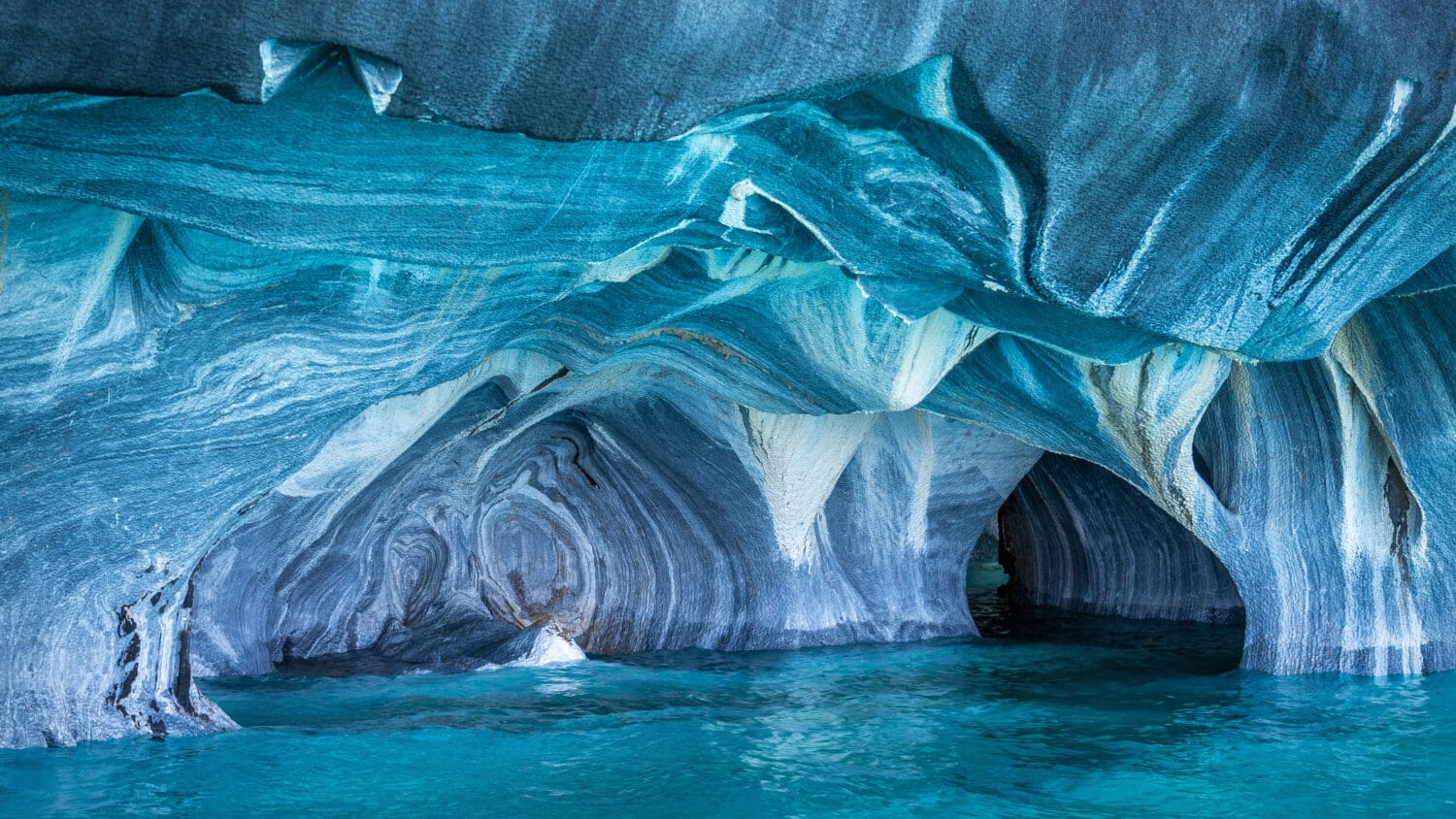 The Marble Caves (Spanish: Cuevas de Marmol ), a series of naturally sculpted caves in the General Carrera Lake in Chile, Patagonia, South America.